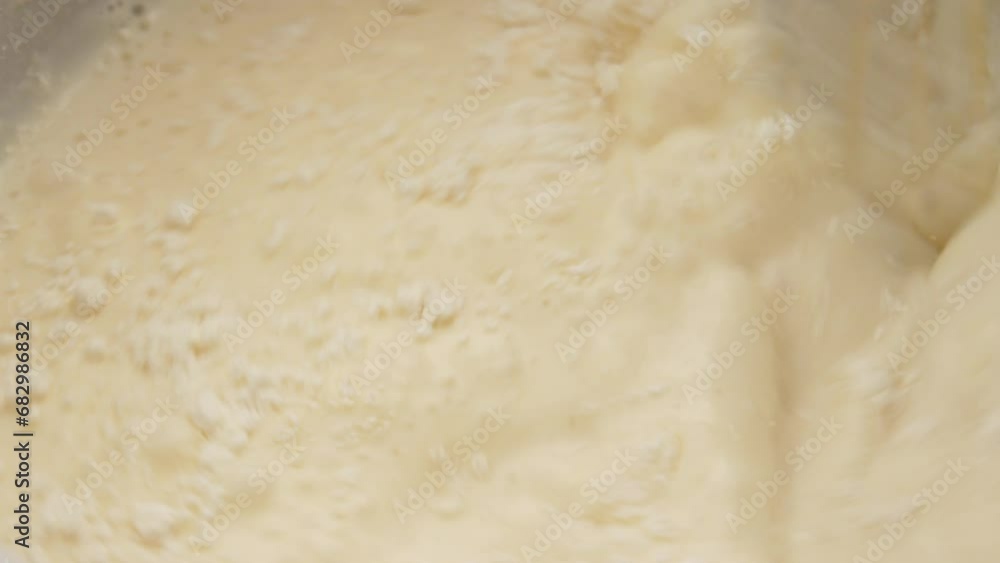 Making butter for pancake. Flour Integration into Liquid, A significant step in food preparation where fine flour particles are mixed thoroughly with a liquid using a whisk. Making butter for pancake. Making butter for pancake. Flour Integration into Liquid, A significant step in food preparation where fine flour particles are mixed thoroughly with a liquid using a whisk. Making butter for pancake.