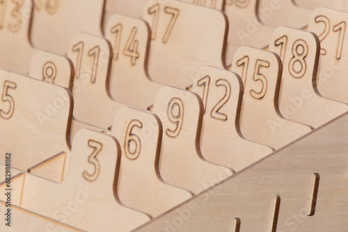 Numbered Sections Figures Storage Objects Parts Made OSB Material Signs Symbols Close-up Detail Object photo