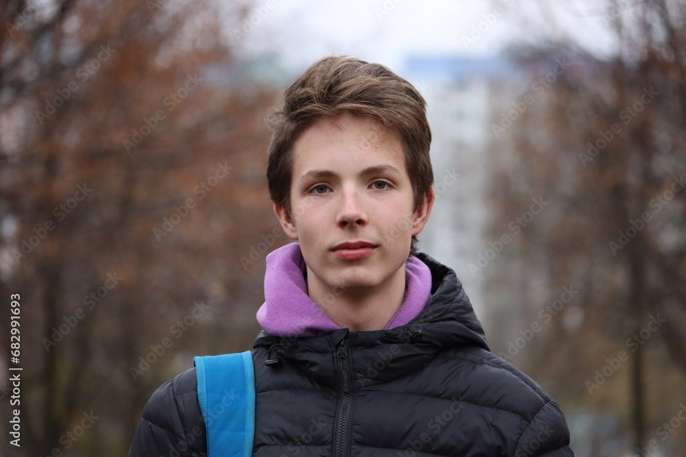 Portrait of a 16 year old boy on the street. Portrait of a 16 year old boy on the street.