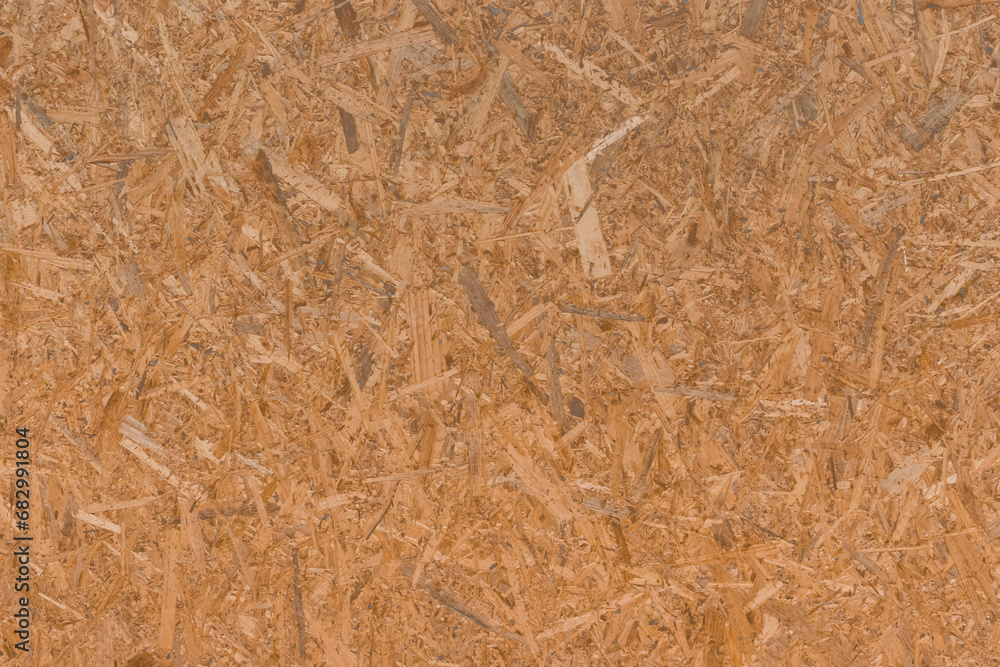 Chipboard brown osb surface pressed wooden pattern texture particleboard background construction material abstract Chipboard brown osb surface pressed wooden pattern texture particleboard background construction material abstract