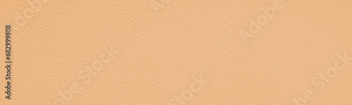 Abstract light orange beige pastel background wide panoramic wall texture. Elegant background with space for design copy space. Gradient. Web banner
