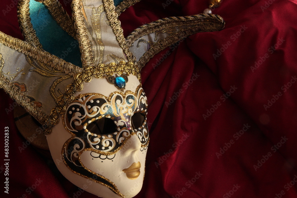 Venetian mask on red background 6
