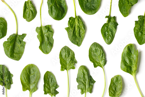 Spinach leaves on white background, top view, flat lay.