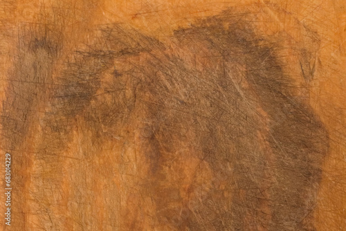 Abstract dark dirty spot wooden surface brown board close-up texture background macro