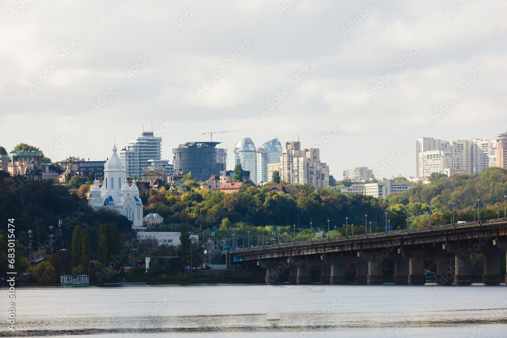 View of the big city on the hills over wide river. View at Paton bridge. Kyiv. Ukraine