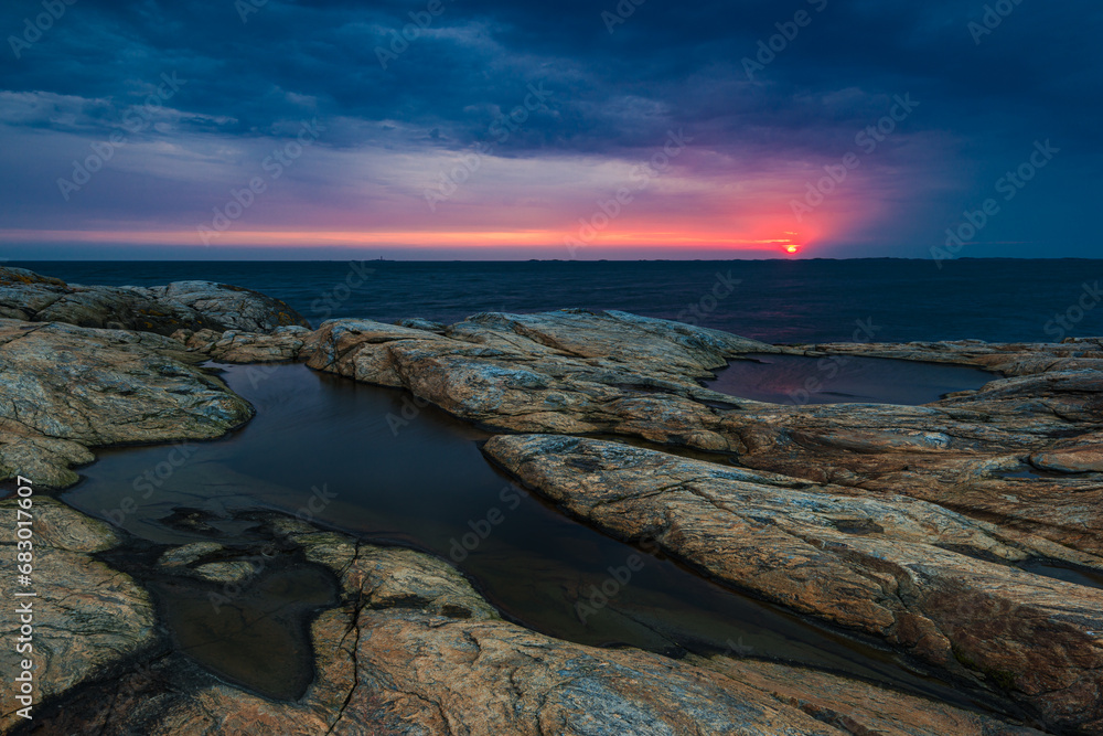 Beautiful Sunset over Sweden's Rocky Coastline