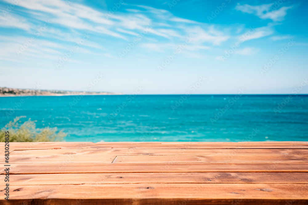 A wooden table set against the backdrop of the sea, an island, and the blue sky.Empty space for text. Bright image. A wooden table set against the backdrop of the sea, an island, and the blue sky.Empty space for text. Bright image.