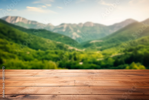 Empty wooden table with a blurred mountain hill background  suitable for montage or displaying your products. 