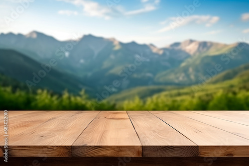 Empty wooden table with a blurred mountain hill background, suitable for montage or displaying your products.
