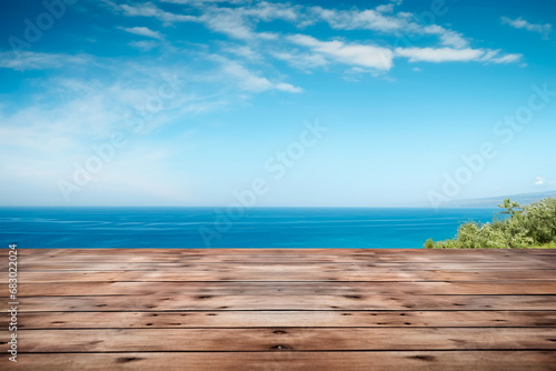 A wooden table set against the backdrop of the sea  an island  and the blue sky.Empty space for text. Bright image.