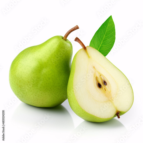A whole green pear and a halved one stand alone, their slices in focus.