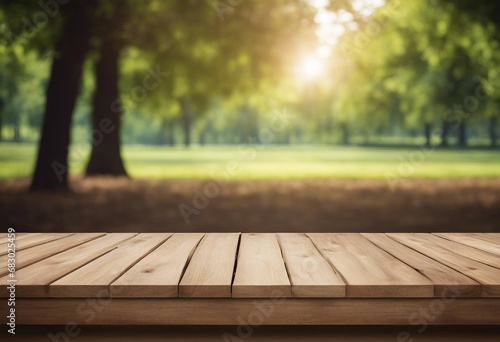 Empty wooden table for product display montages in the park with nature background High quality photo