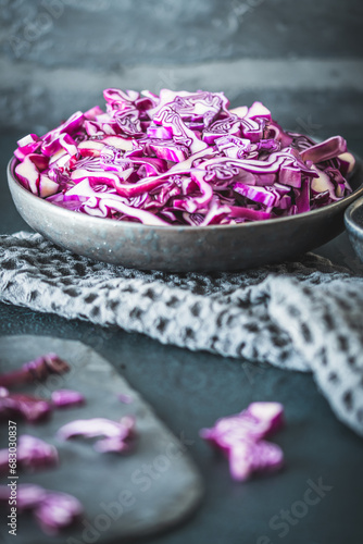 Wallpaper Mural Fresh red cabbage, cut into pieces and strips, on gray table Torontodigital.ca