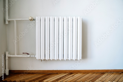 Wallpaper Mural Heating radiator in the interior of an apartment or house during the cold winter heating period Torontodigital.ca