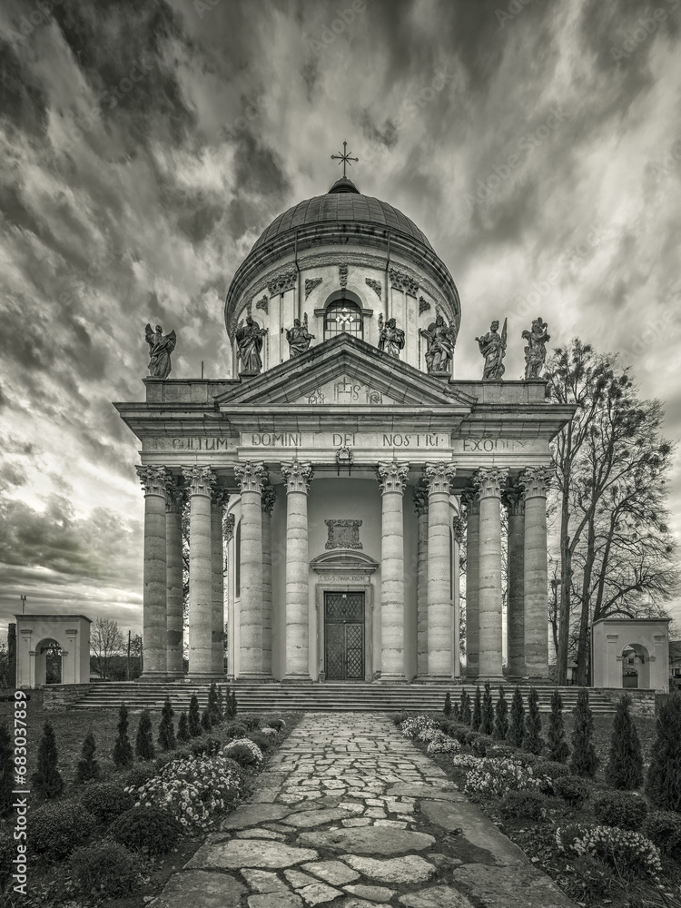 wide angle view to cathedral with columns under dramatic sky in vintage style wide angle view to cathedral with columns under dramatic sky in vintage style