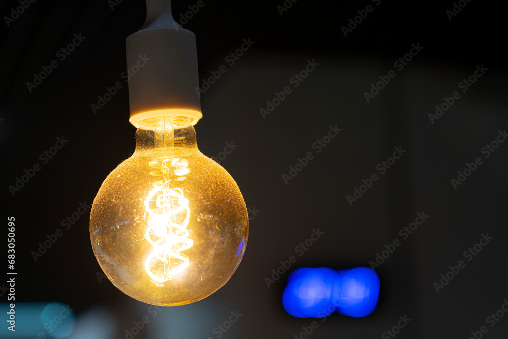 ornamental incandescent lamp with helicoidal filament for a relaxed atmosphere. ornamental incandescent lamp with helicoidal filament for a relaxed atmosphere.