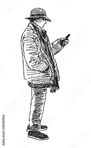 Sketch of casual townsman in hat standing outdoor and looking at smartphone