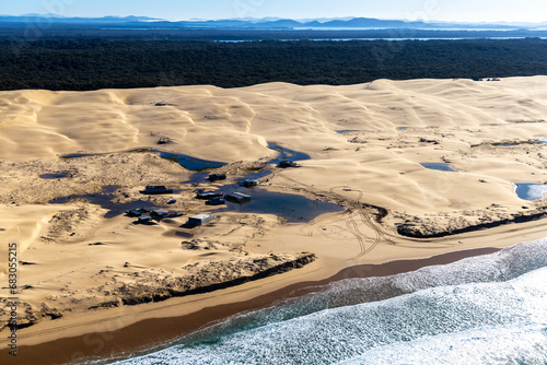 Aerial view of dwelling sin the sand dunes., , photo