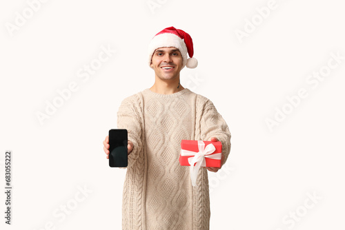 Handsome young man in Santa...