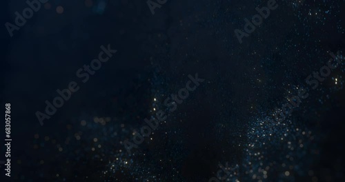 Seamless loop of flowing particles in an abstract background. 3D render photo
