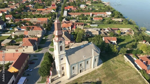 Drone flight around Orthodox church and village Stari Banovci, Serbia photo