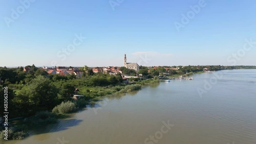 Ascending drone above river Danube near village Stari Banovci, Serbia photo