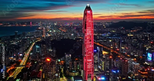 Aerial video of the city financial district skyline at night in Shenzhen, Guangdong Province, China photo