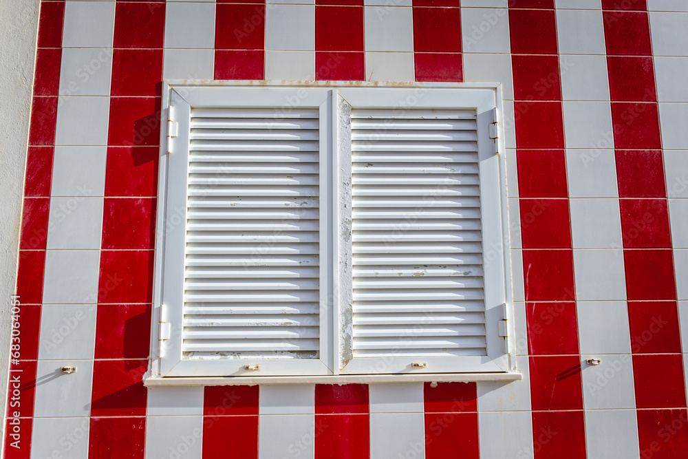 Fototapeta premium Details of painted house called Palheiro in Costa Nova area of Aveiro city in the Centro Region of Portugal