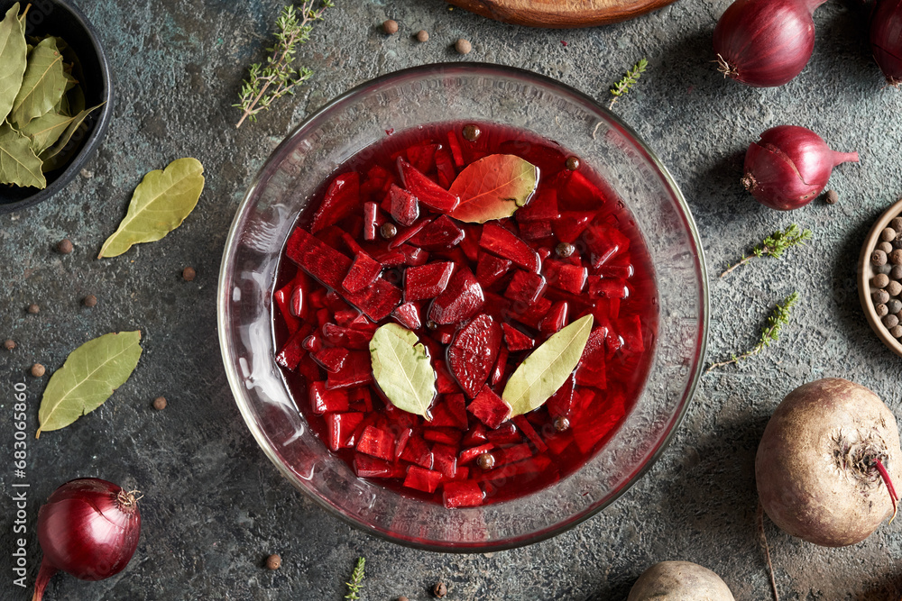 Homemade fermented red beet kvass in a glass bowl Homemade fermented red beet kvass in a glass bowl
