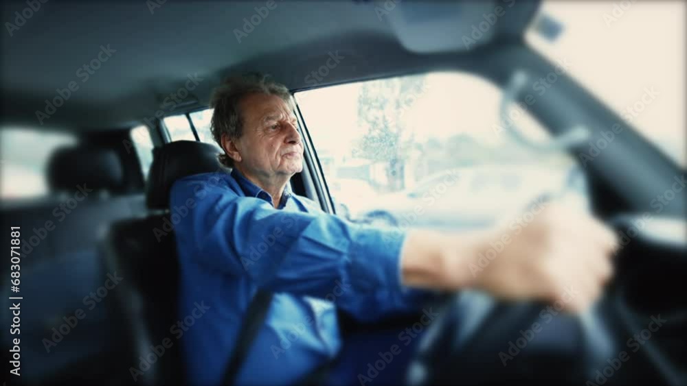 Older man driving moving car sitting inside vehicle Older man driving moving car sitting inside vehicle