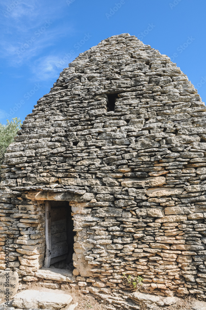 One of the dry stone hut in Village des Bories open air museum near Gordes village in Provence region of France