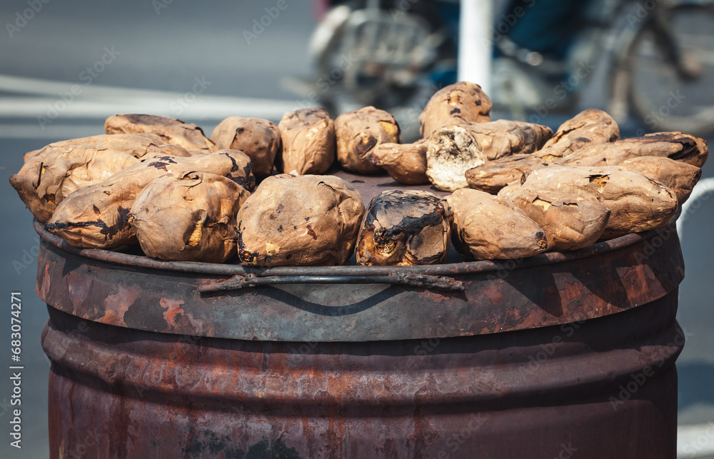 Roasted sweet potatoes on street stand in Beijing, China