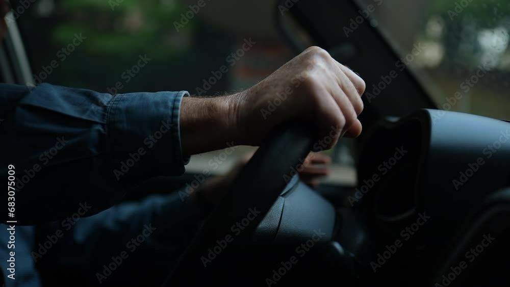 Person hands driving car holding steering wheel. Senior Man driver. Slow motion 120fps commuting on road Person hands driving car holding steering wheel. Senior Man driver. Slow motion 120fps commuting on road