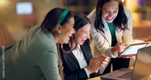 Tech, high five and applause with business women in the office together for support or success. Internet, teamwork and motivation with a happy young employee group clapping in the workplace at night photo