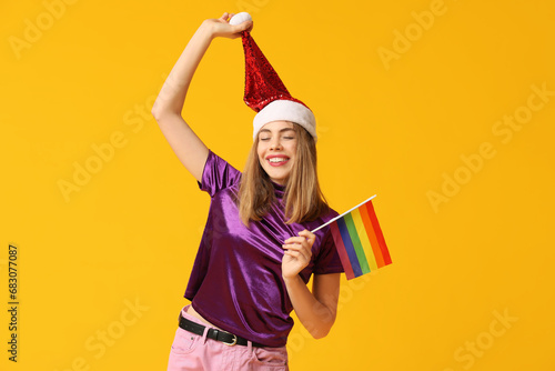 Happy young woman in santa ...