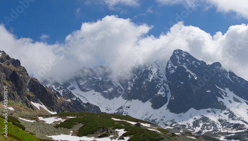 Wallpaper Mural landscape with clouds and snowy peaks of the high tatras Torontodigital.ca