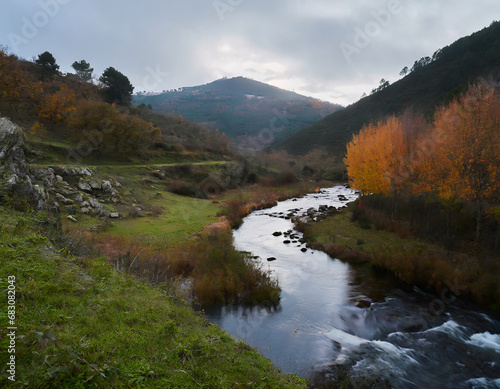 nature and environment  small winding river between the mountains  autumn