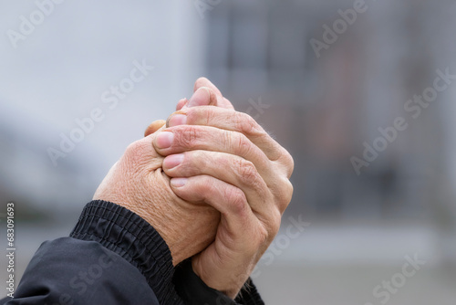 Male hands without gloves in winter.Risk of frostbite of hand outdoors during cold weather because of frost in winter.