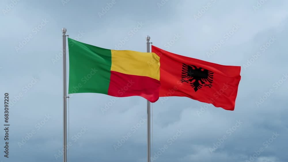 Benin flag and Albania flag waving together on cloudy sky, endless seamless loop Benin flag and Albania flag waving together on cloudy sky, endless seamless loop