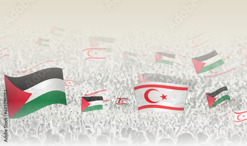 Palestine and Northern Cyprus flags in a crowd of cheering people.