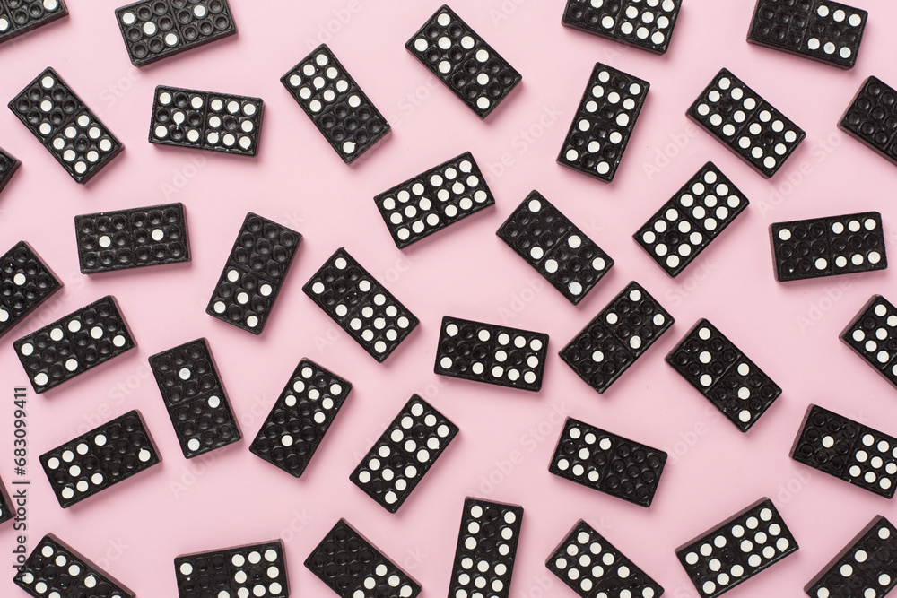 Black domino tiles on color background, top view Black domino tiles on color background, top view
