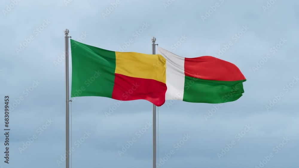 Madagascar flag and Benin flag waving together on cloudy sky, endless seamless loop, two country relations concept Madagascar flag and Benin flag waving together on cloudy sky, endless seamless loop, two country relations concept