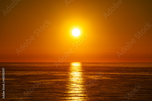 Sunrise over sea water
