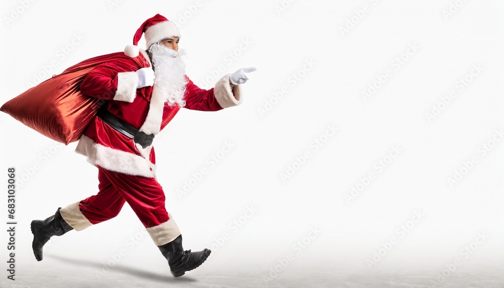 Santa Claus pulls big red sack with gifts, which can be changed into a banner isolated on white background with copy space. New Year greeting card. Christmas concept.
Santa Claus pulls big red sack with gifts, which can be changed into a banner isolated on white background with copy space. New Year greeting card. Christmas concept.