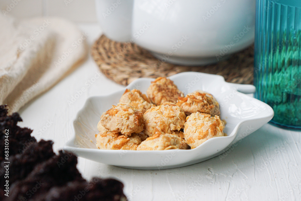 Cornflakes cookies in a white plate. Selective focus. Cornflakes cookies in a white plate. Selective focus.