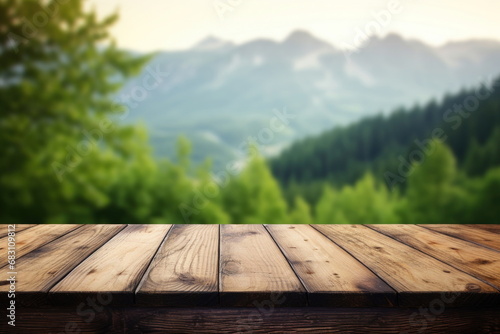 Wooden table on the mountain with green nature background