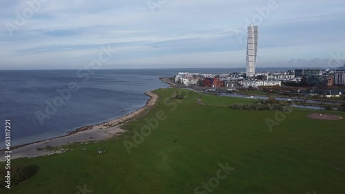 Scenic drone footage of Malmo, Sweden. Fascinating aerial views of the shore, seaside and Turning Torso.