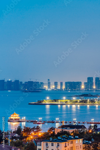 Night view of Zhanqiao skyline in Shinan District, Qingdao, Shandong, China photo