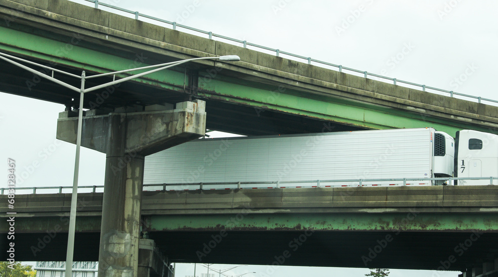 highway overpass under golden sunset, symbolizing urban connectivity and modern transportation infrastructure