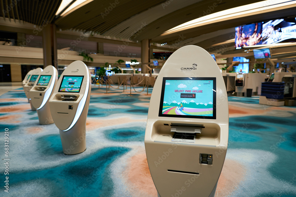 SINGAPORE - NOVEMBER 06, 2023: self check-in kiosks in Singapore Changi ...
